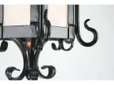 Wyrób kuty: Kuta Lampa Wisząca z Ornamentyką Kowalską