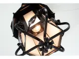 Wyrób kuty: Wisząca Lampa Kowalska z Ornamentem Liściastym